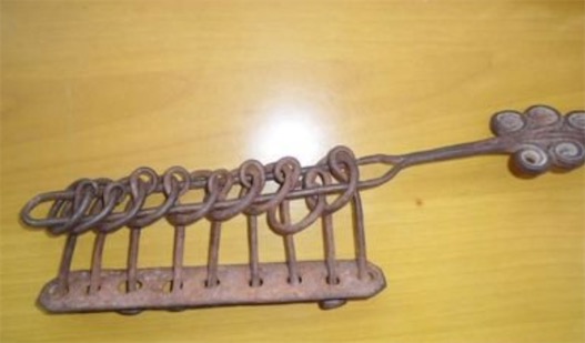 世界最早的連環(huán)玩具 南宋市場上流行的“解玉板”