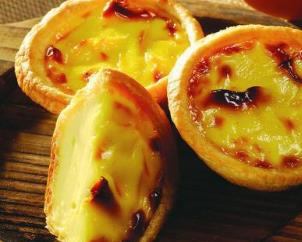 蛋撻店十大品牌 七哥蛋撻主要產(chǎn)品有多達(dá)22種口味的手工葡式蛋撻